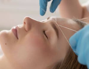 depilación con hilo